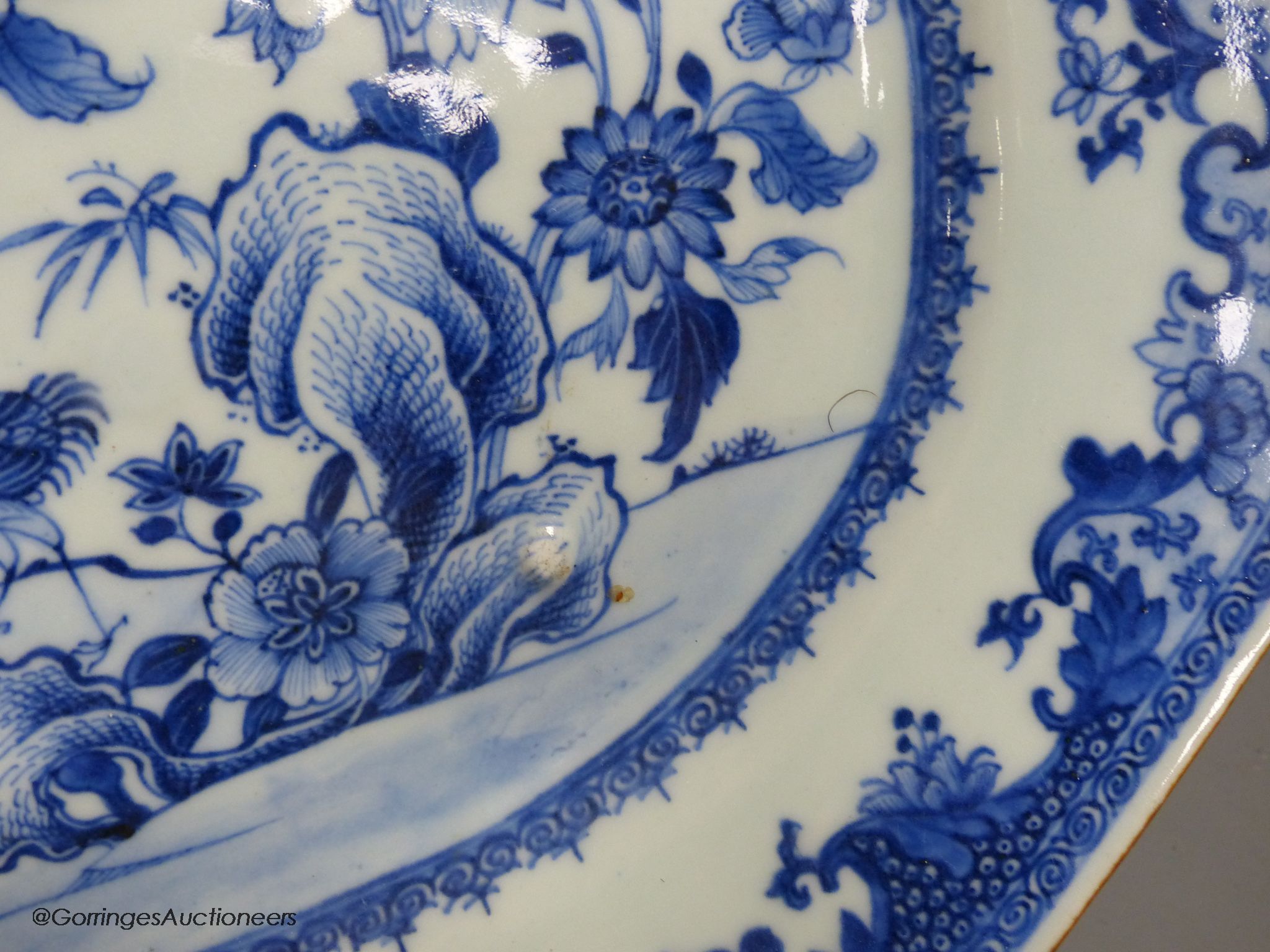Two 18th century Chinese export blue and white meat dishes, largest 43cm